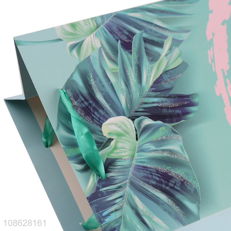 Online wholesale paper party favors bag gift bag with handles