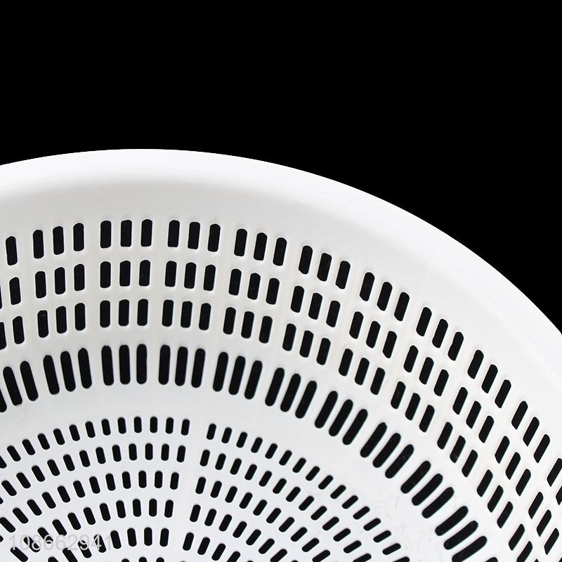 Online wholesale round plastic fruit vegetable drain basket for kitchen