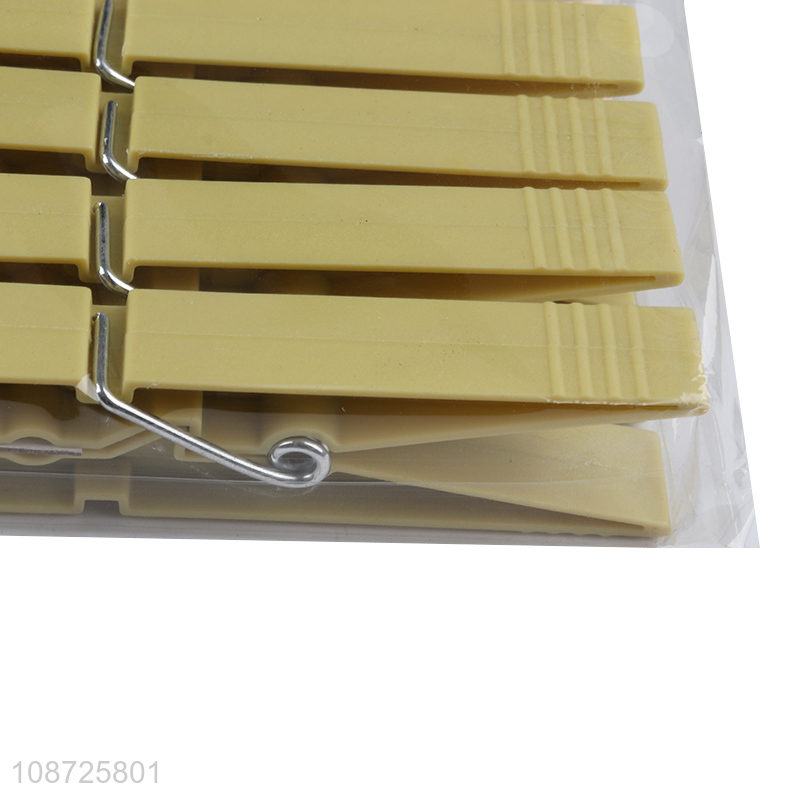 Wholesale 36pcs outdoor windproof plastic clothes pegs with springs