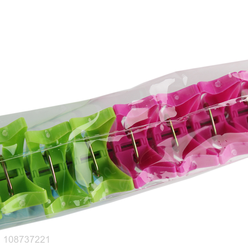 Low price 24pcs outdoor plastic clothes pins for hanging clothes