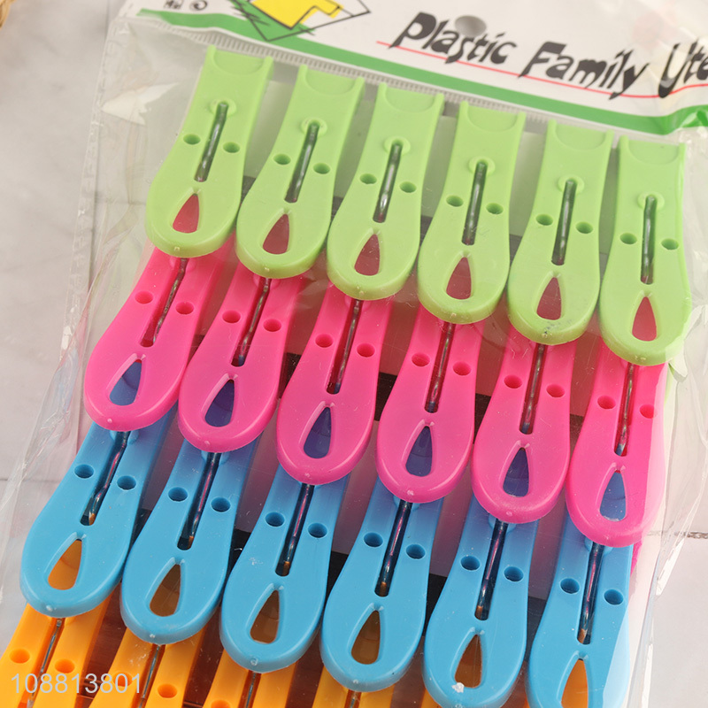 China imports 24pcs colored plastic clothes pins with spring