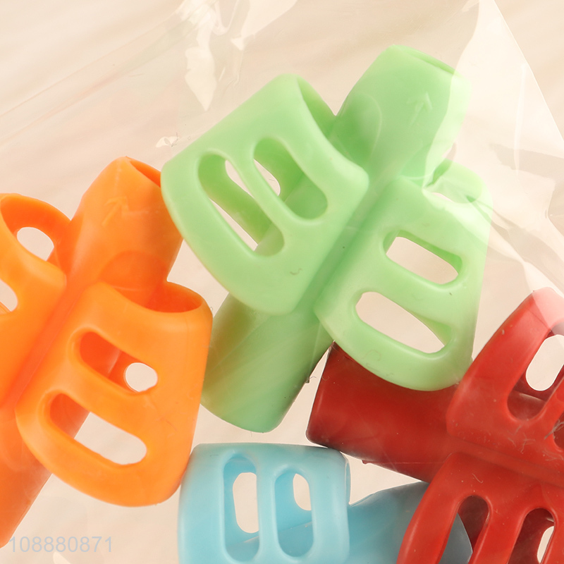 Yiwu market 4pcs children writing aid gel pencil grips