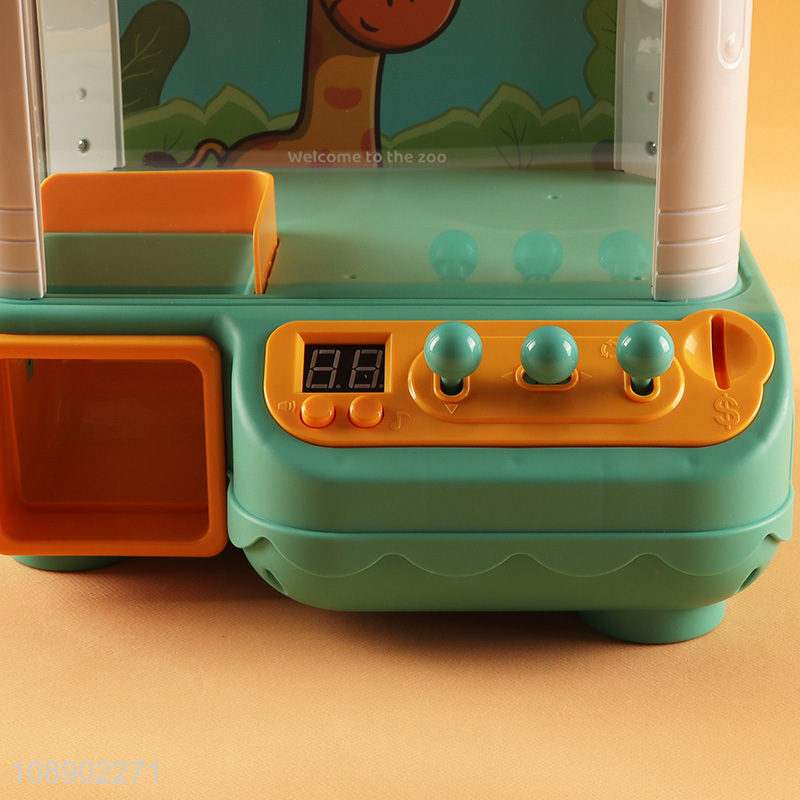 Hot selling mini grabbing clamping toys doll catching machine set