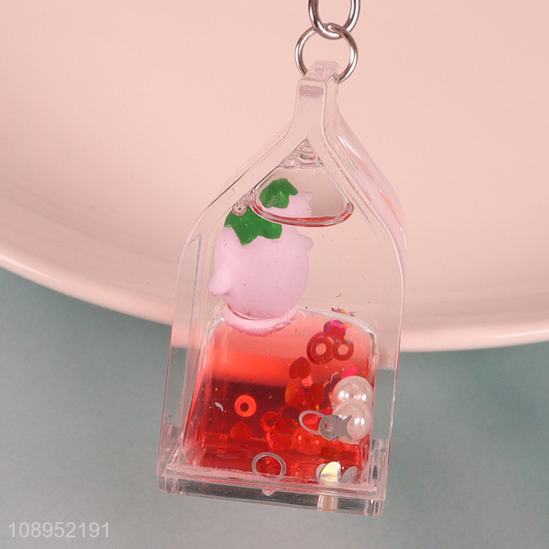 China supplier decorative portable quicksand bottle pendant keychain