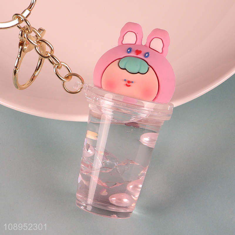 Most popular portable cartoon pendant quicksand keychain for sale