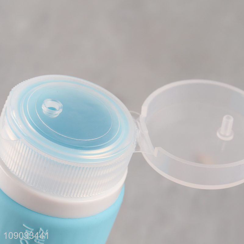 High quality portable travel silicone squeeze bottle with facial cleaning brush