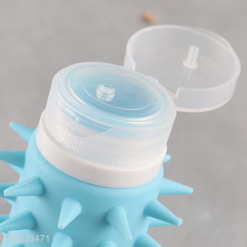 Yiwu market portable travel silicone squeeze bottle shampoo bottle with brush