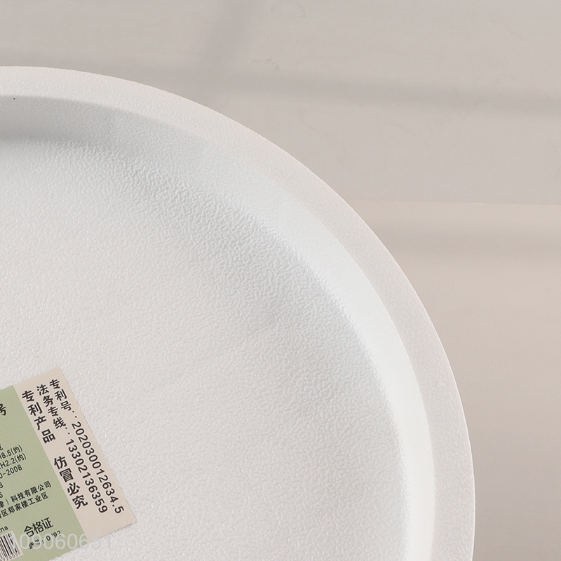 Hot selling round durable flower pot tray rack holder with wheels wholesale