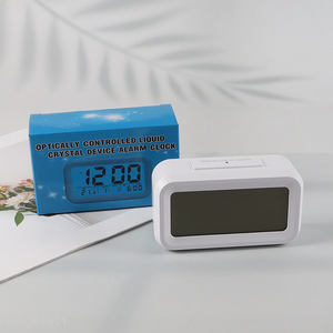 Yiwu market optically controlled liquid crystal device alarm clock table clock