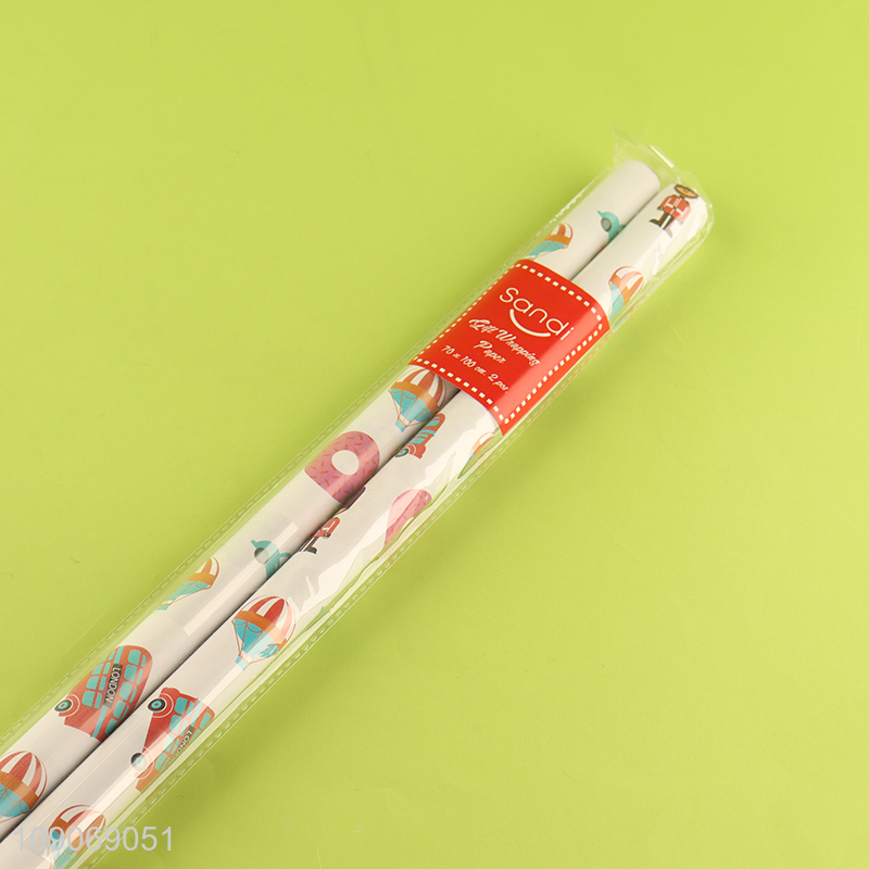 Online wholesale cartoon printed disposable gifts packaging paper wrap roll