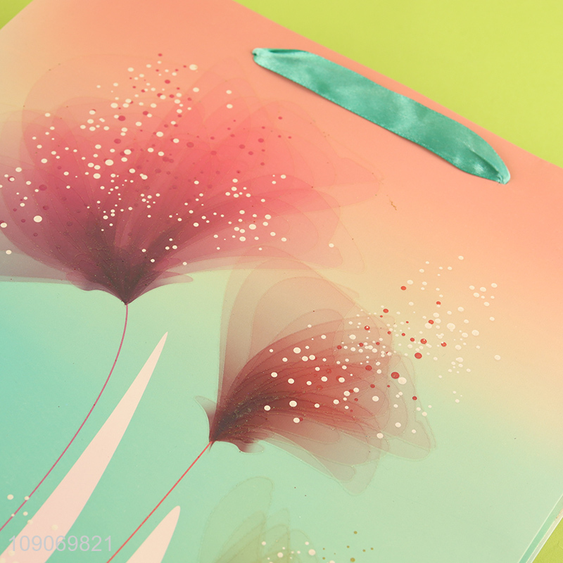 Factory direct sale eco-friendly gifts packaging paper bag wholesale