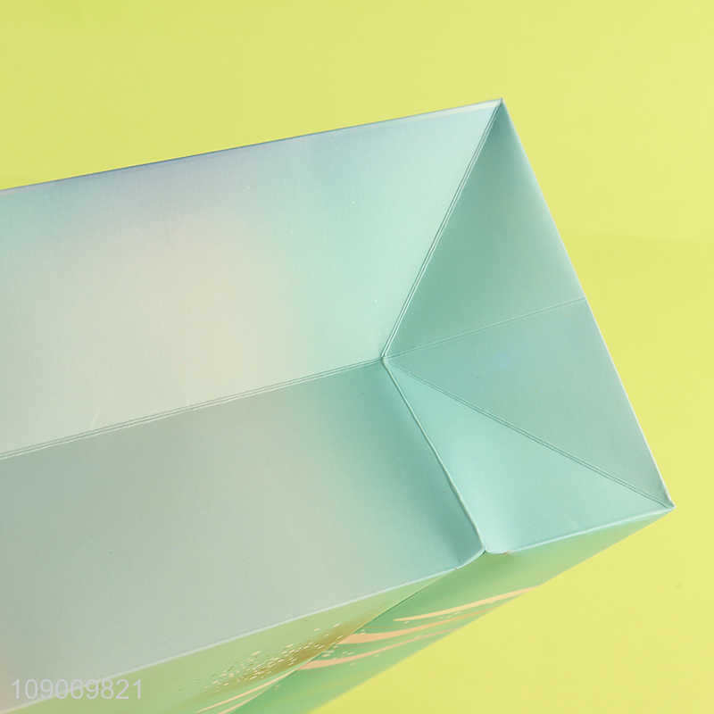 Factory direct sale eco-friendly gifts packaging paper bag wholesale