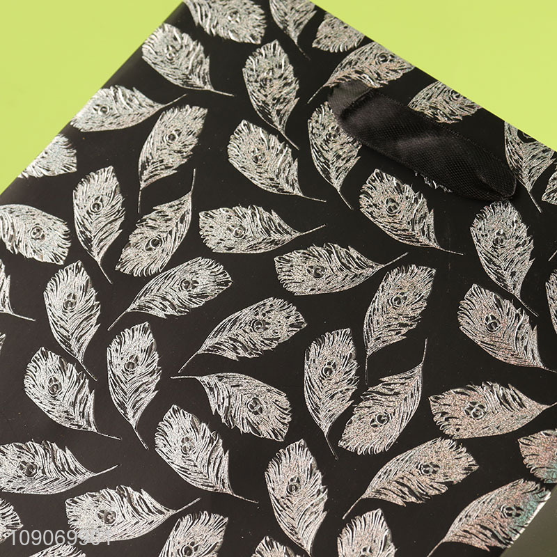 Best price leaves pattern eco-friendly gifts packaging paper bag