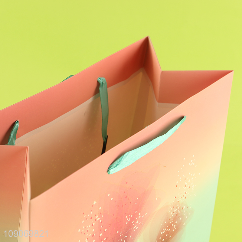 Factory direct sale eco-friendly gifts packaging paper bag wholesale