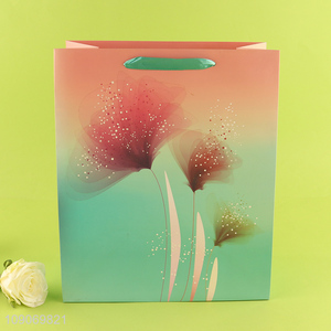 Factory direct sale eco-friendly gifts packaging paper bag wholesale