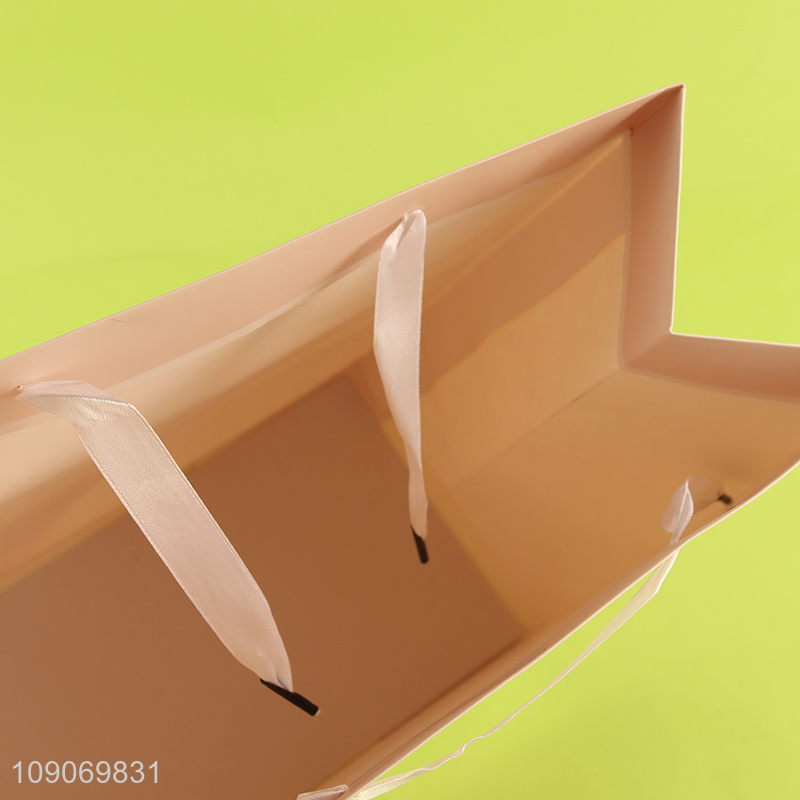 Yiwu market portable gifts packaging paper bag tote bag for sale