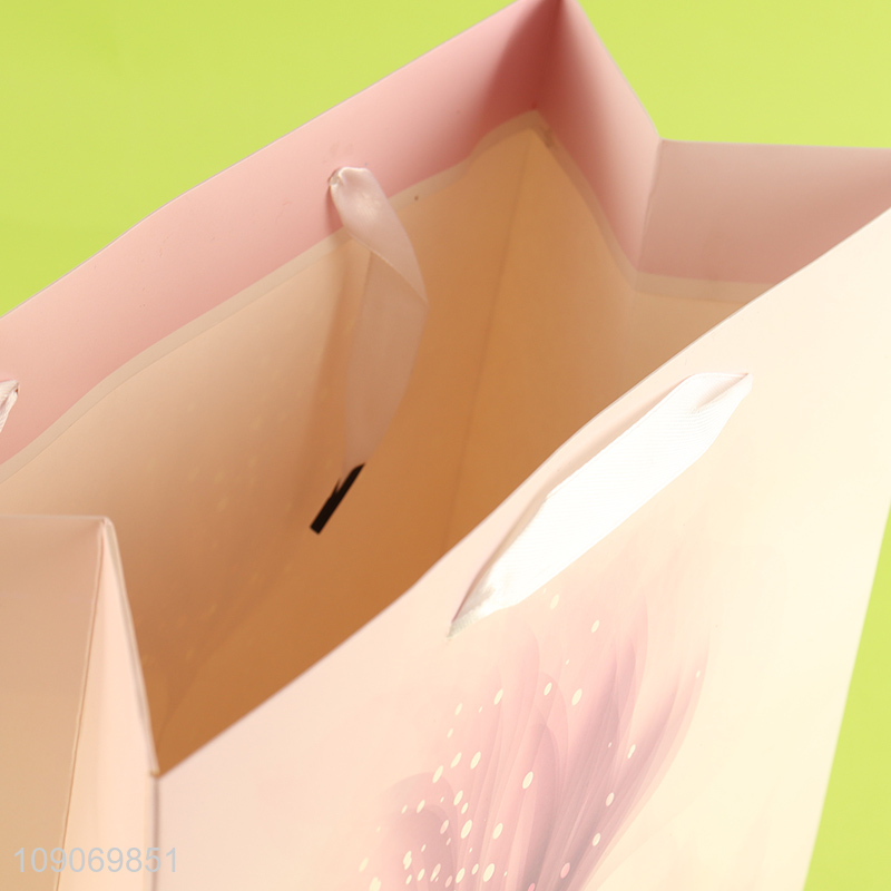 China supplier portable gifts packaging paper bag shopping bag