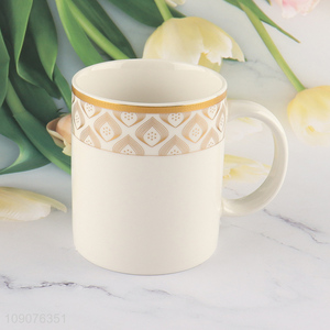 Online wholesale white ceramic water cup drinking cup with handle