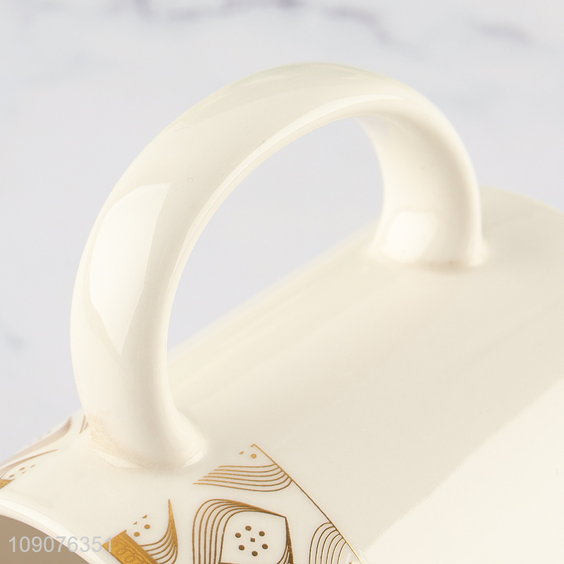 Online wholesale white ceramic water cup drinking cup with handle
