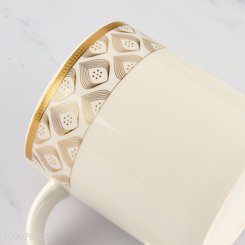 Online wholesale white ceramic water cup drinking cup with handle