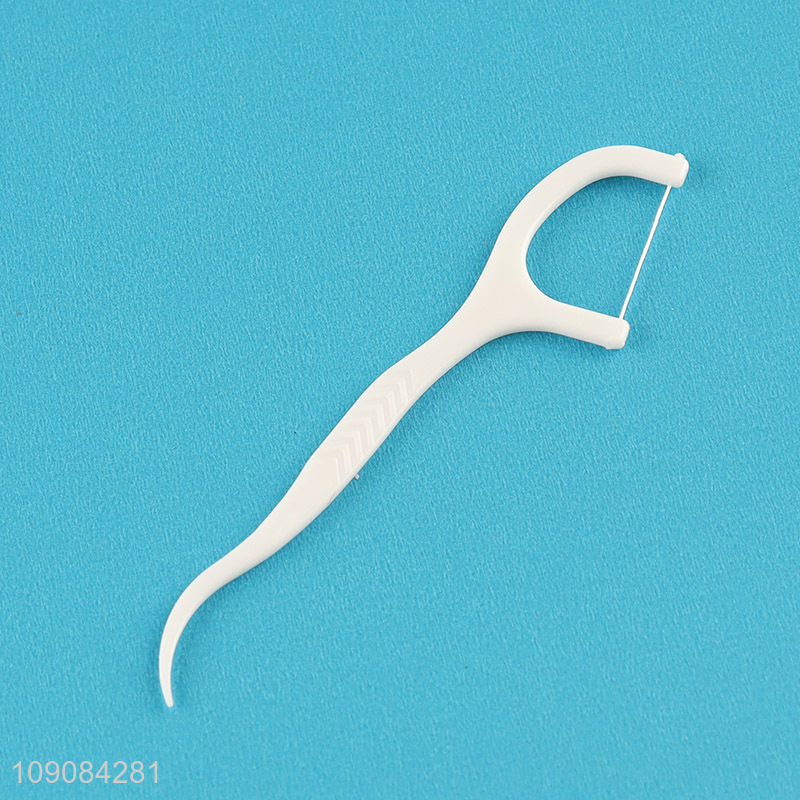 Low price heart shape plastic box dental flosser for teeth cleaning