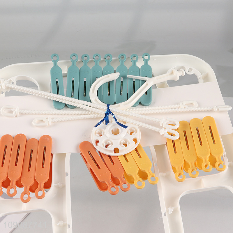 Best selling household plastic multifunctional drying hanger with clips