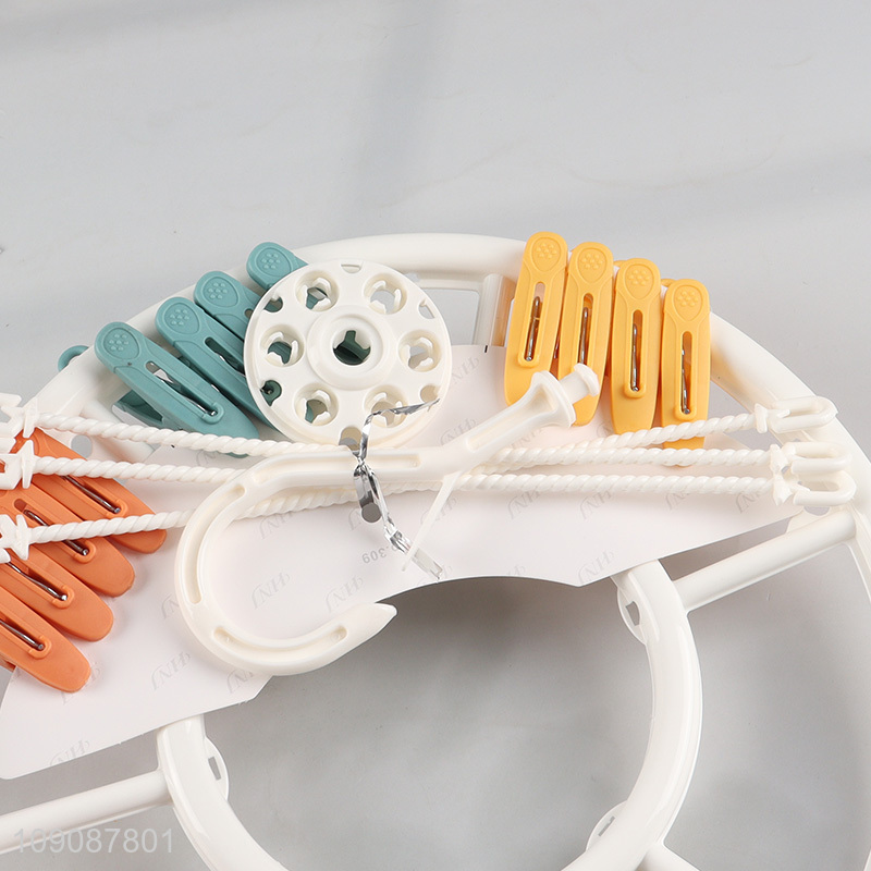 Online wholesale household plastic drying hanger socks clips socks rack