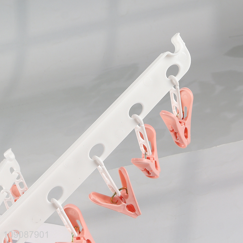 China products folding plastic clothes hanger rack socks drying rack