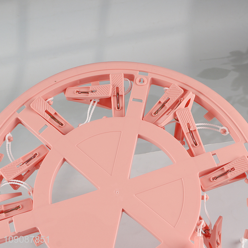 Good selling pink plastic household multifunctional drying hanger clothes hanger socks clips