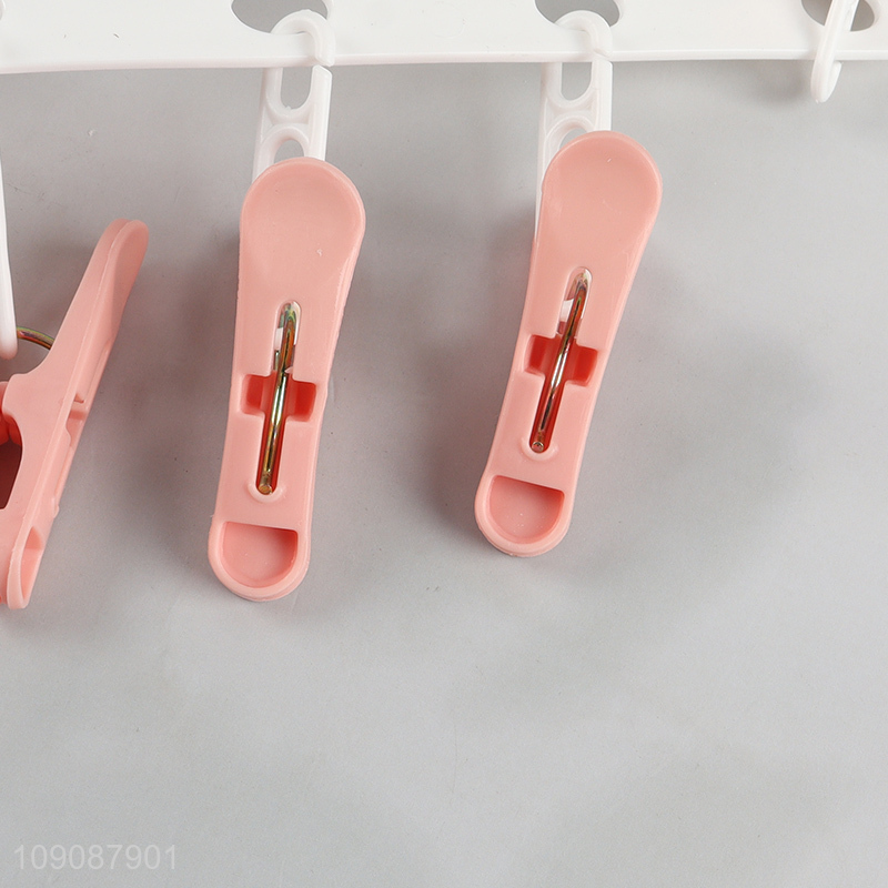 China products folding plastic clothes hanger rack socks drying rack