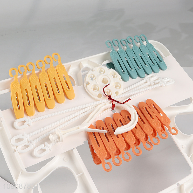 Yiwu market windproof multifunctional drying hanger socks clips for household