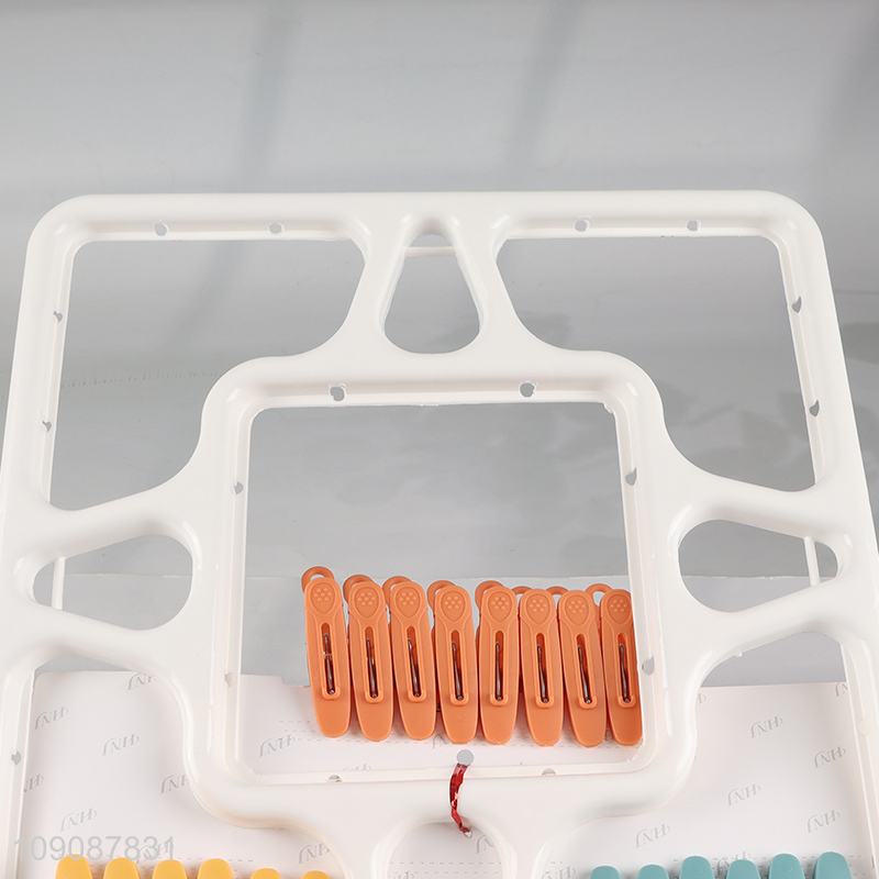 Yiwu market windproof multifunctional drying hanger socks clips for household