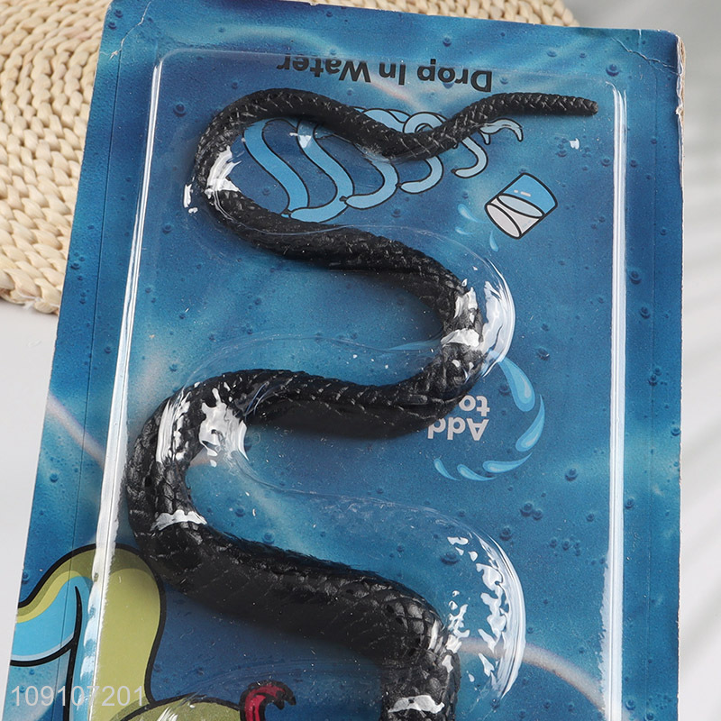 Hot products black snake shape water growing toys for kids