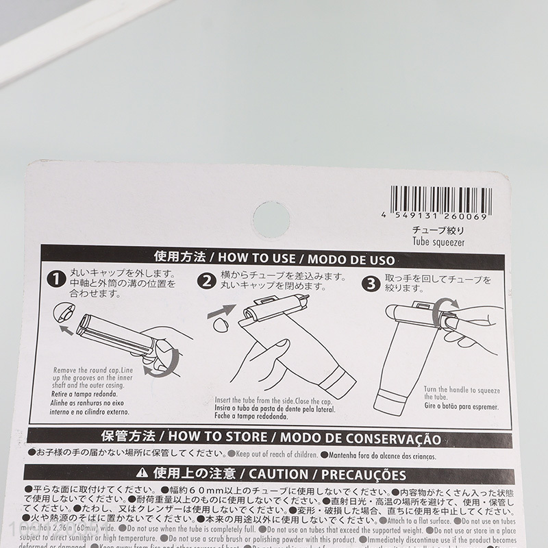 Good Quality Plastic Toothpaste Squeezer Roller with Suction Cup for Bathroom