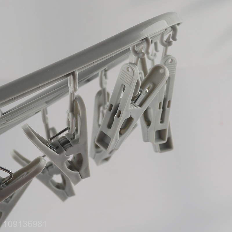 China Wholesale Clothes Drying Rack Underwear Hangers with 14 Clips