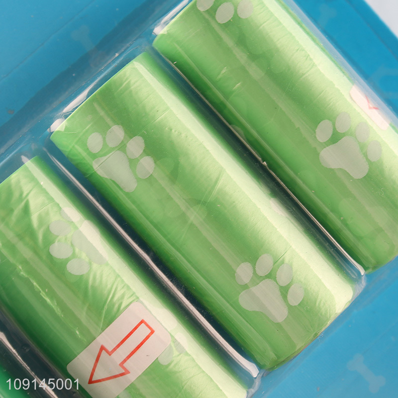 China Imports 4 Rolls Dog Waste Bags with Bone Shaped Poop Bag Dispenser