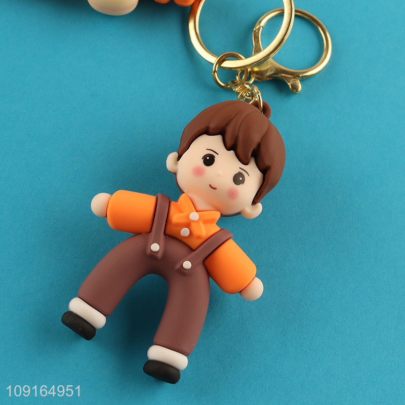 Yiwu market portable boys pendant keychain key ring for sale