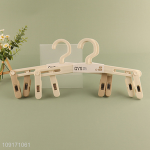 Yiwu market 2pcs plastic household pants hanger for sale