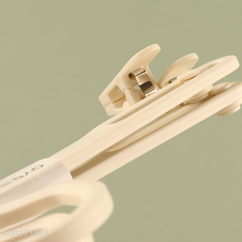 Yiwu market 2pcs plastic household pants hanger for sale