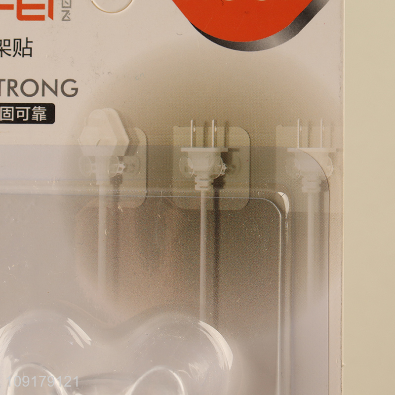 Top selling 2pcs household paste strong plug holder sticker wholesale