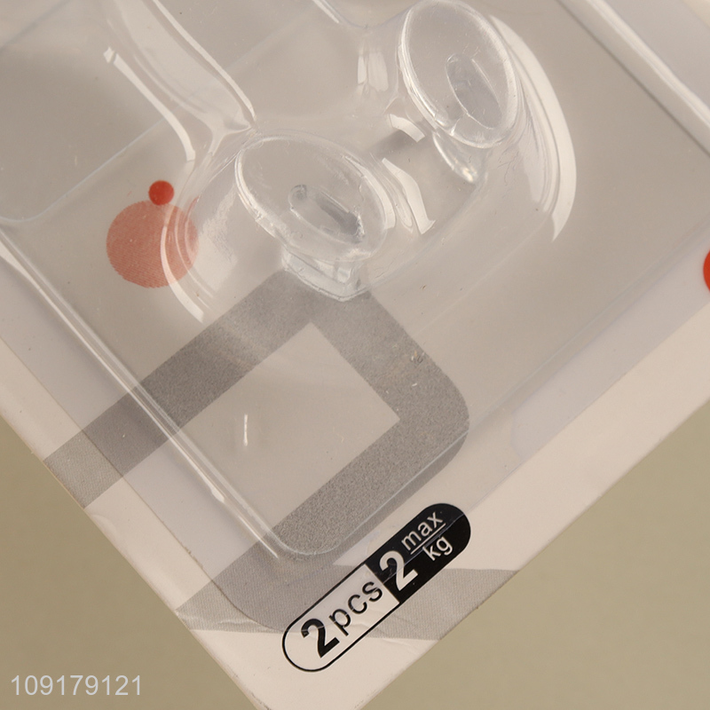 Top selling 2pcs household paste strong plug holder sticker wholesale