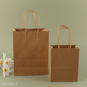 Good Quality Kraft Paper Gift Bag with Handles for Birthday Party Favors