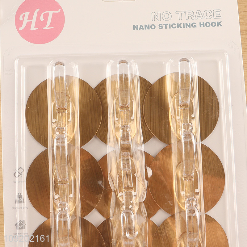 Yiwu market 12pcs golden round sticky hook adhesive hook for kitchen