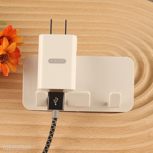 New Arrival No Drilling Adhesive Wall Mounted Power Plug Holder