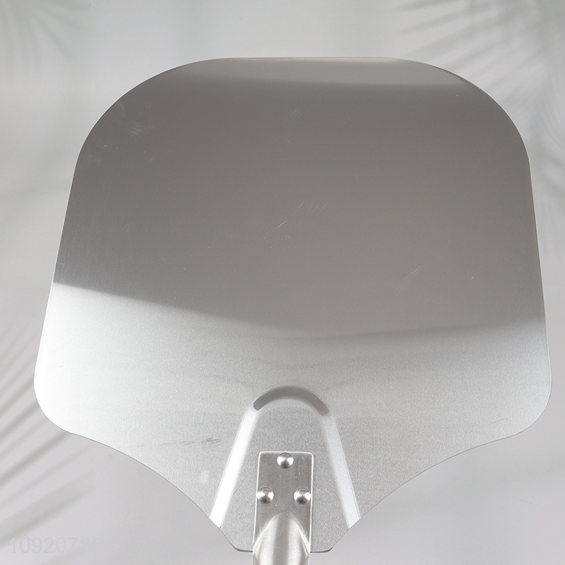 Yiwu market non-stick aluminum pizza shovel pizza plate with handle