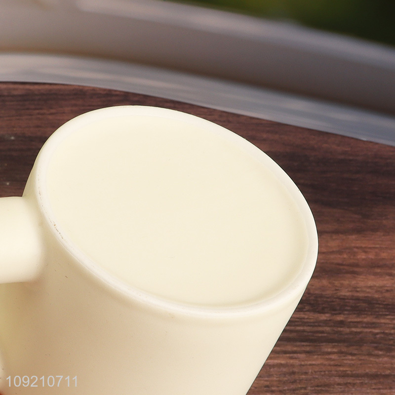 Yiwu market white ceramic 320ml water cup coffee cup with handle
