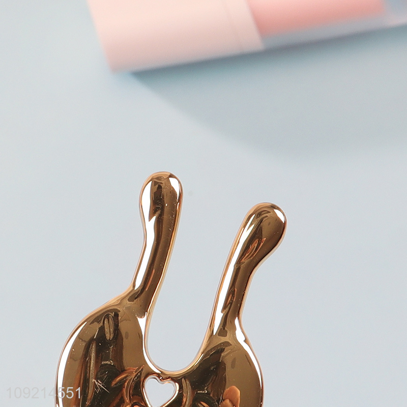 Good quality bowknot shape professional nose ear massager for sale