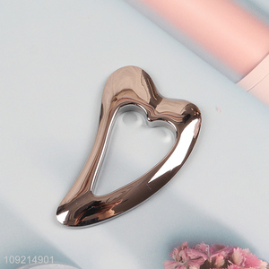 Hot selling heart shape hollow silver scraping massage board