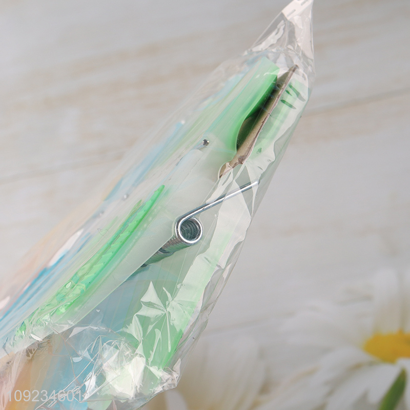 Low price multicolor plastic clothes pegs clothes clips set for home