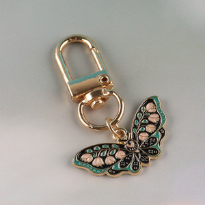 Low price butterfly shape portable alloy keychain key rings for gifts